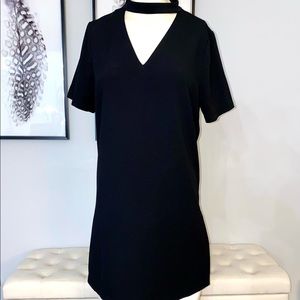 Boutique Dress. Pretty neck detail, black. Fits straight down